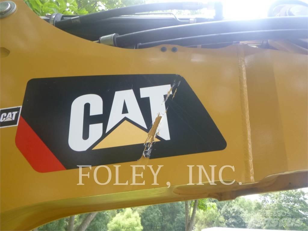 CAT 450-07 لوادر ذات جرافات عكسية