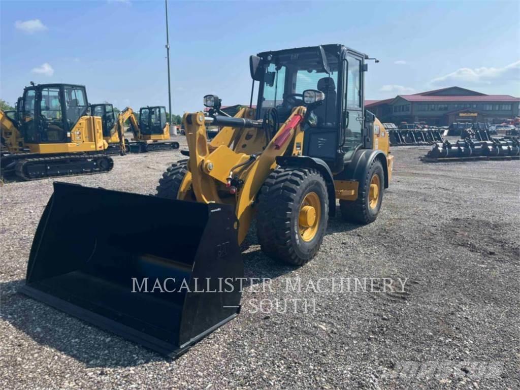 CAT 906 لوادر بعجل