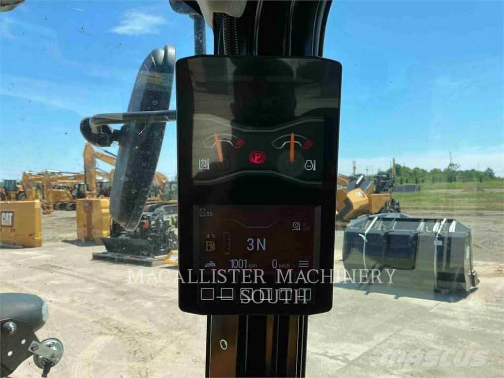 CAT 906 لوادر بعجل