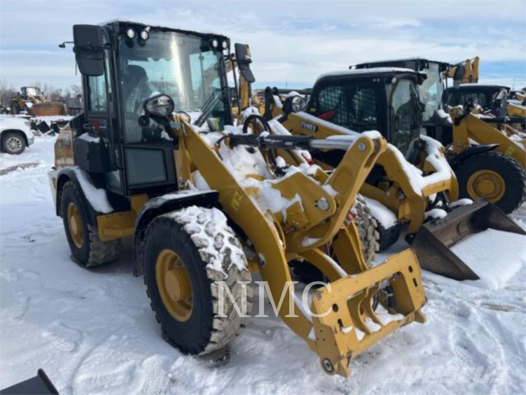 CAT 906-14 لوادر بعجل