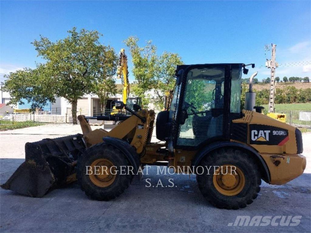 CAT 906H2 لوادر بعجل
