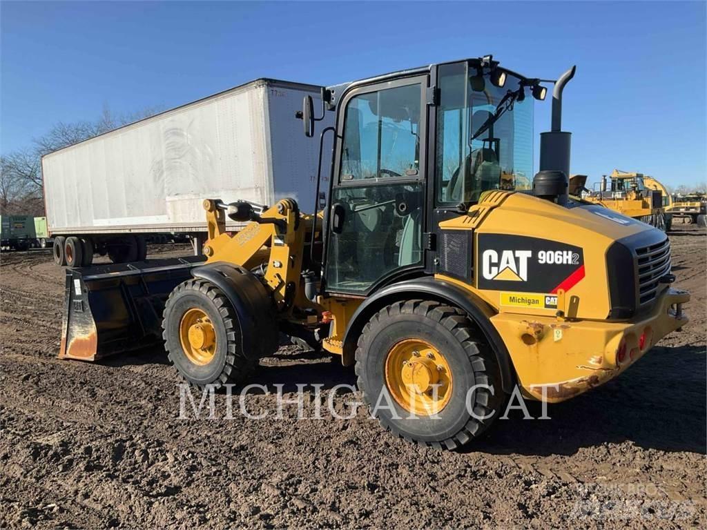 CAT 906H2 AR لوادر بعجل