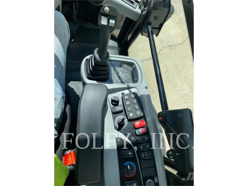 CAT 906M لوادر بعجل