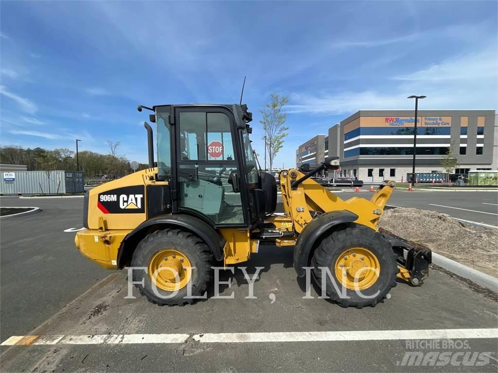 CAT 906M لوادر بعجل