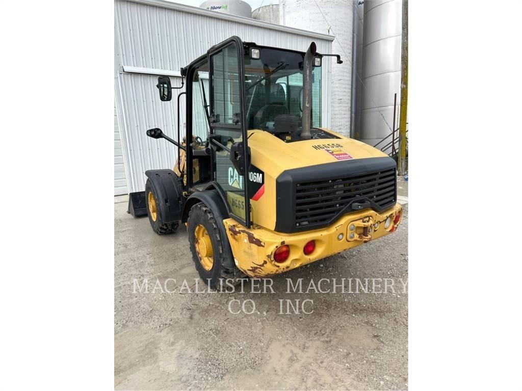CAT 906M لوادر بعجل