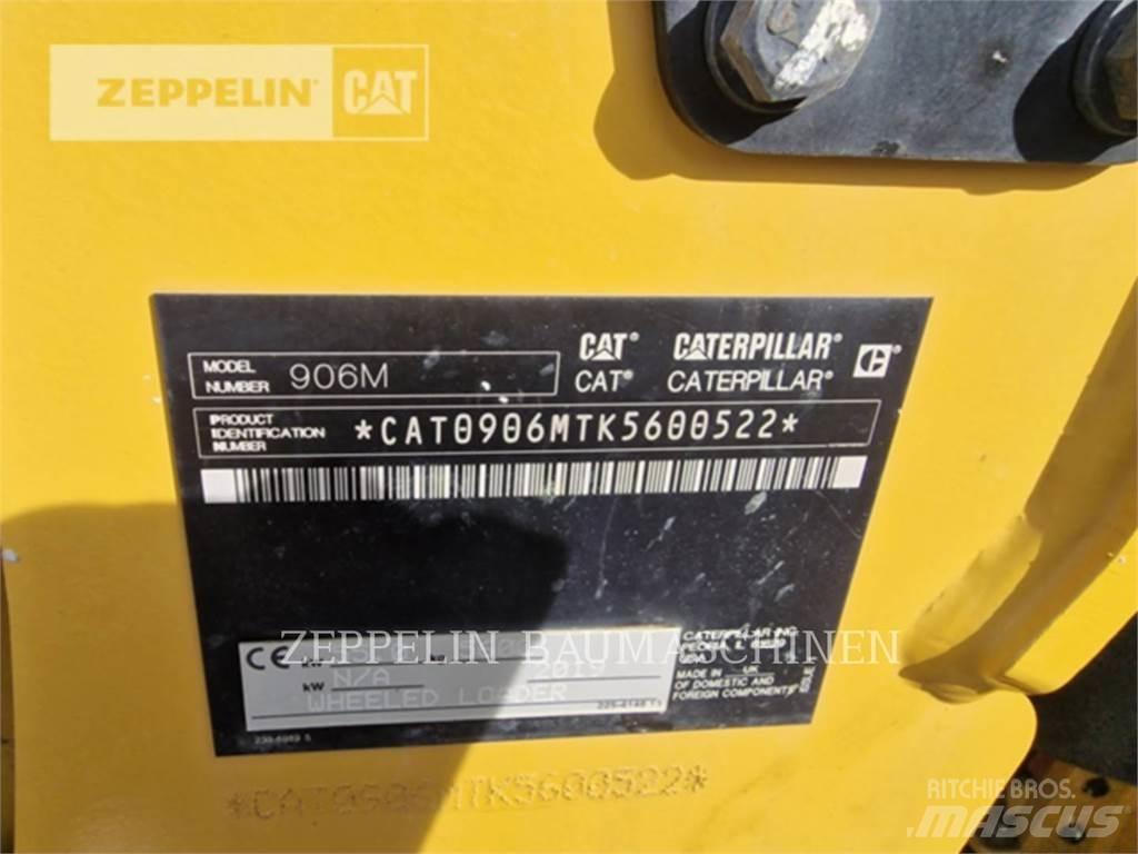 CAT 906M لوادر بعجل