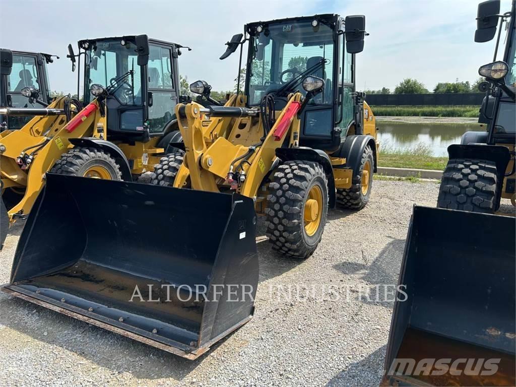 CAT 907-14 لوادر بعجل