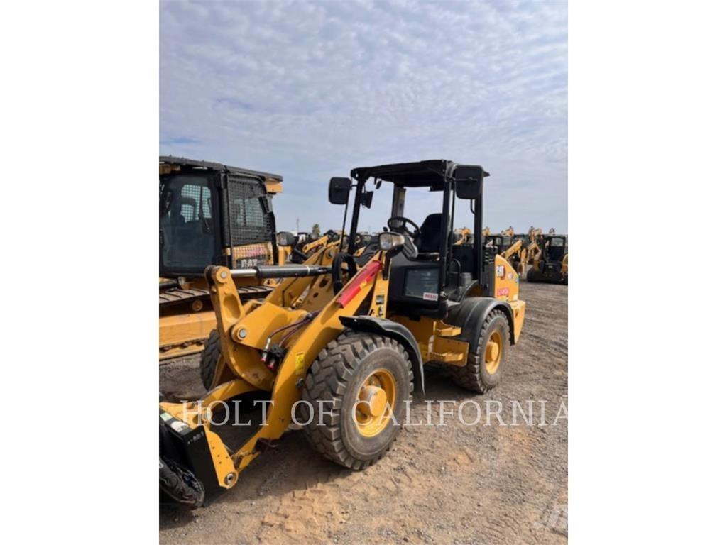 CAT 907-14 لوادر بعجل
