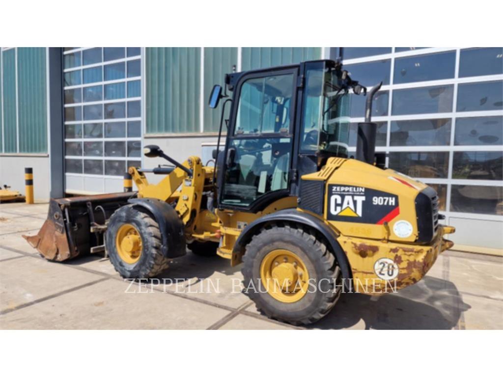 CAT 907H لوادر بعجل