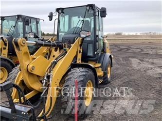 CAT 907M لوادر بعجل