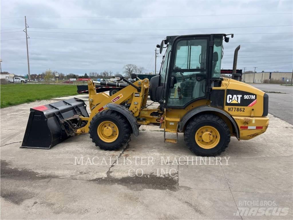 CAT 907M لوادر بعجل