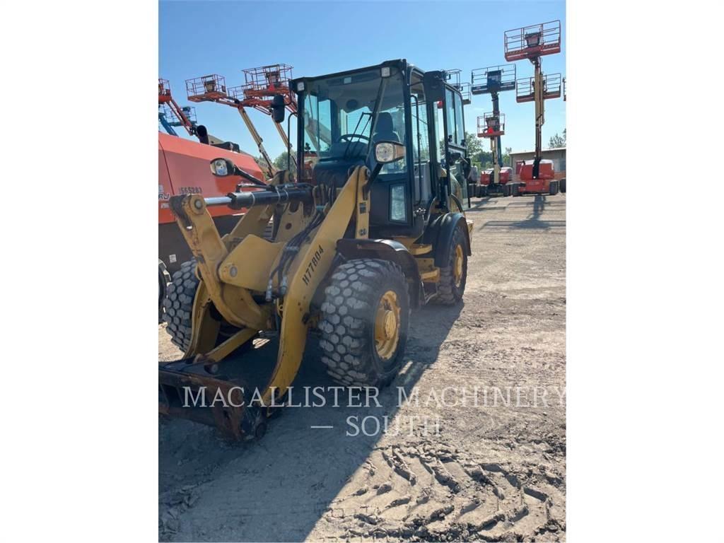 CAT 907M لوادر بعجل
