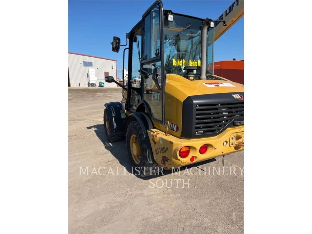 CAT 907M لوادر بعجل
