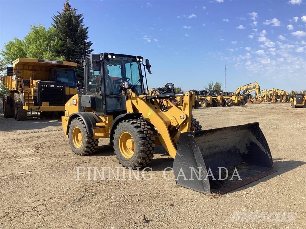 CAT 908 لوادر بعجل