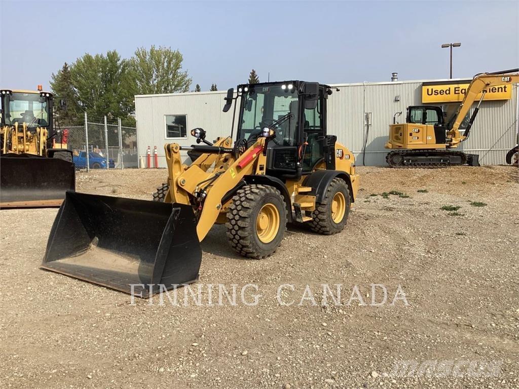CAT 908 لوادر بعجل