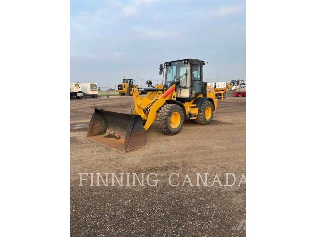 CAT 908 لوادر بعجل