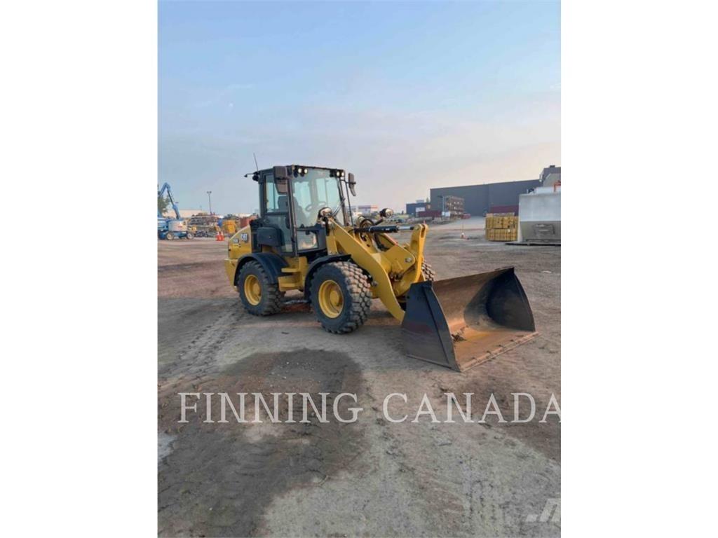 CAT 908 لوادر بعجل