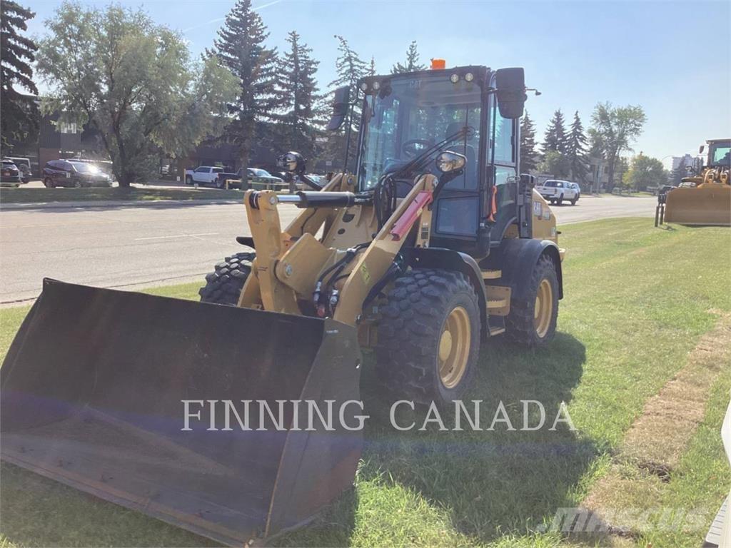 CAT 908 لوادر بعجل