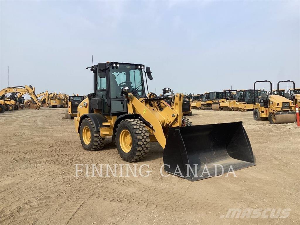 CAT 908 لوادر بعجل