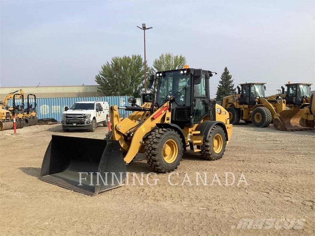 CAT 908 لوادر بعجل