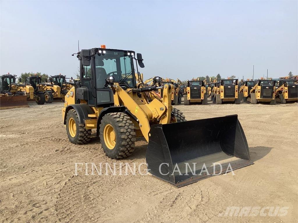 CAT 908 لوادر بعجل
