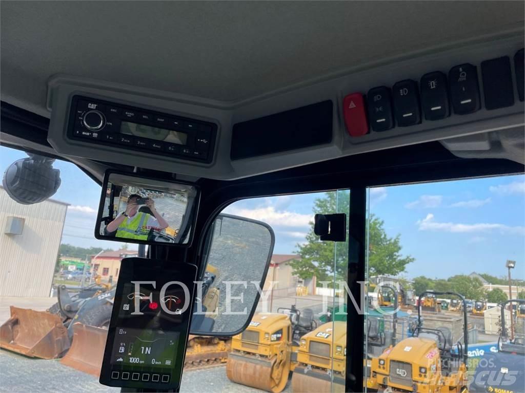 CAT 908-14 لوادر بعجل