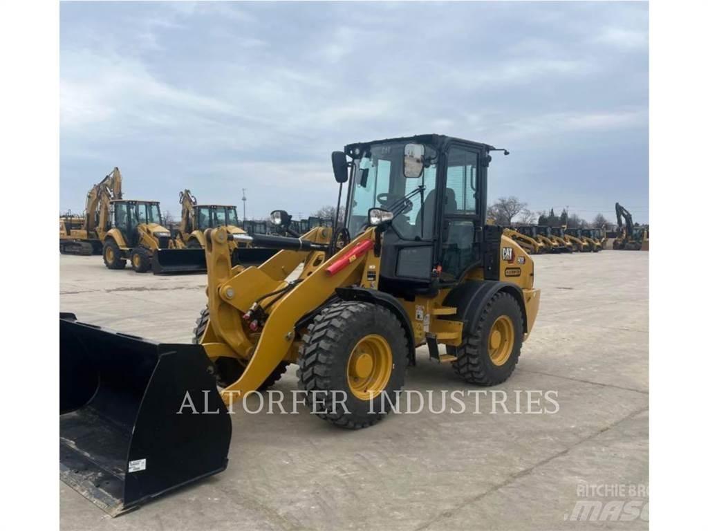 CAT 908-14 لوادر بعجل