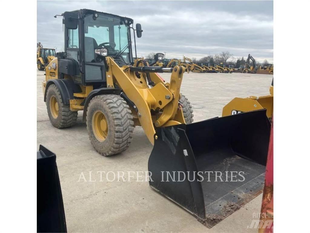 CAT 908-14 لوادر بعجل