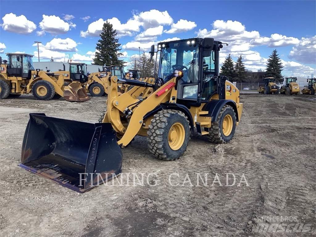 CAT 908-14 لوادر بعجل