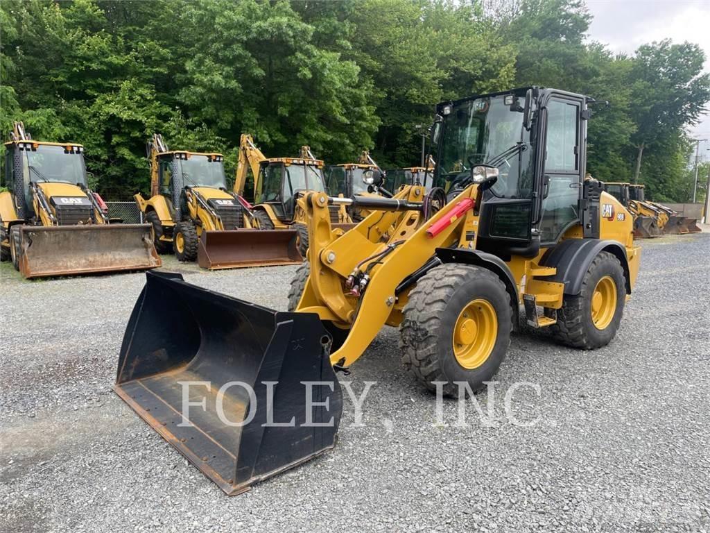 CAT 908-14 لوادر بعجل