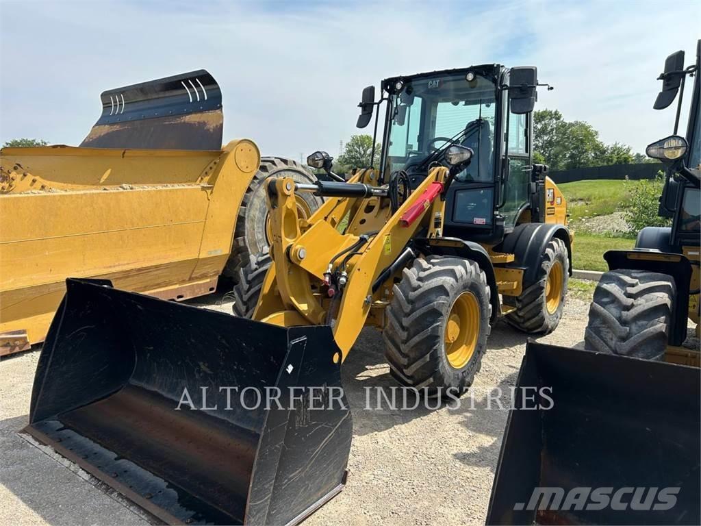 CAT 908-14 لوادر بعجل
