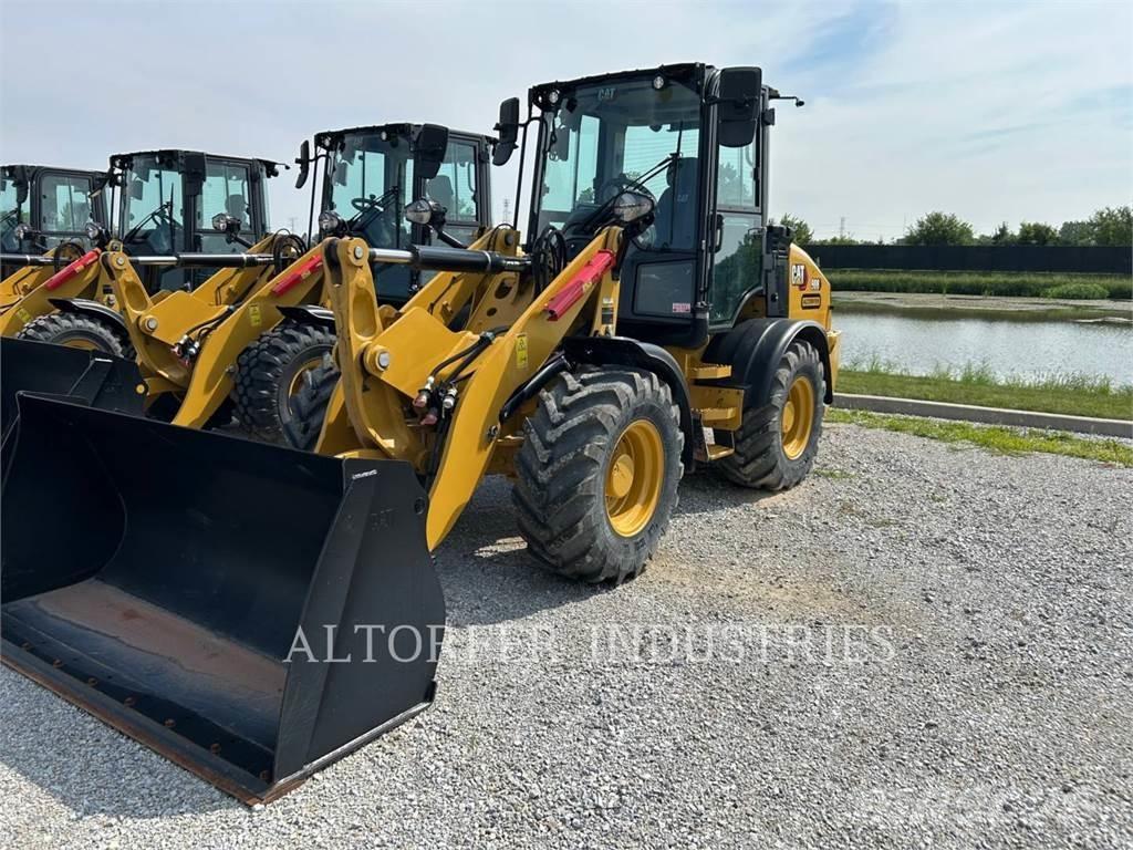 CAT 908-14 لوادر بعجل