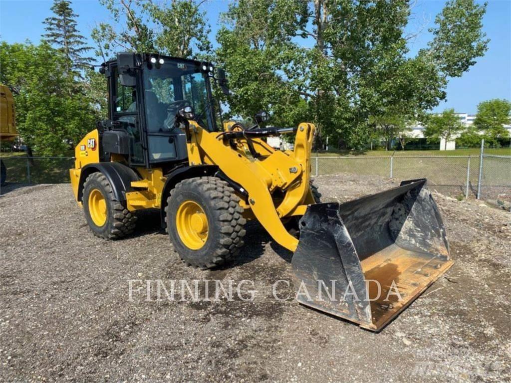 CAT 908-14 لوادر بعجل