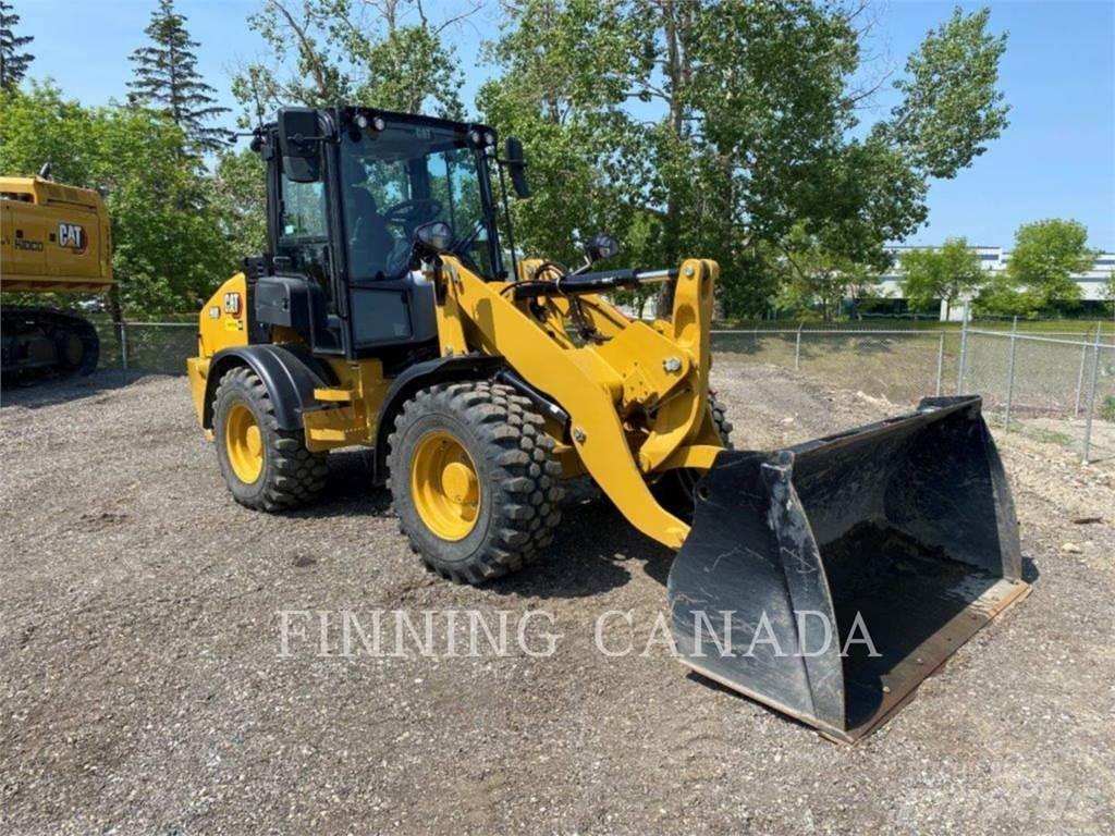 CAT 908-14 لوادر بعجل