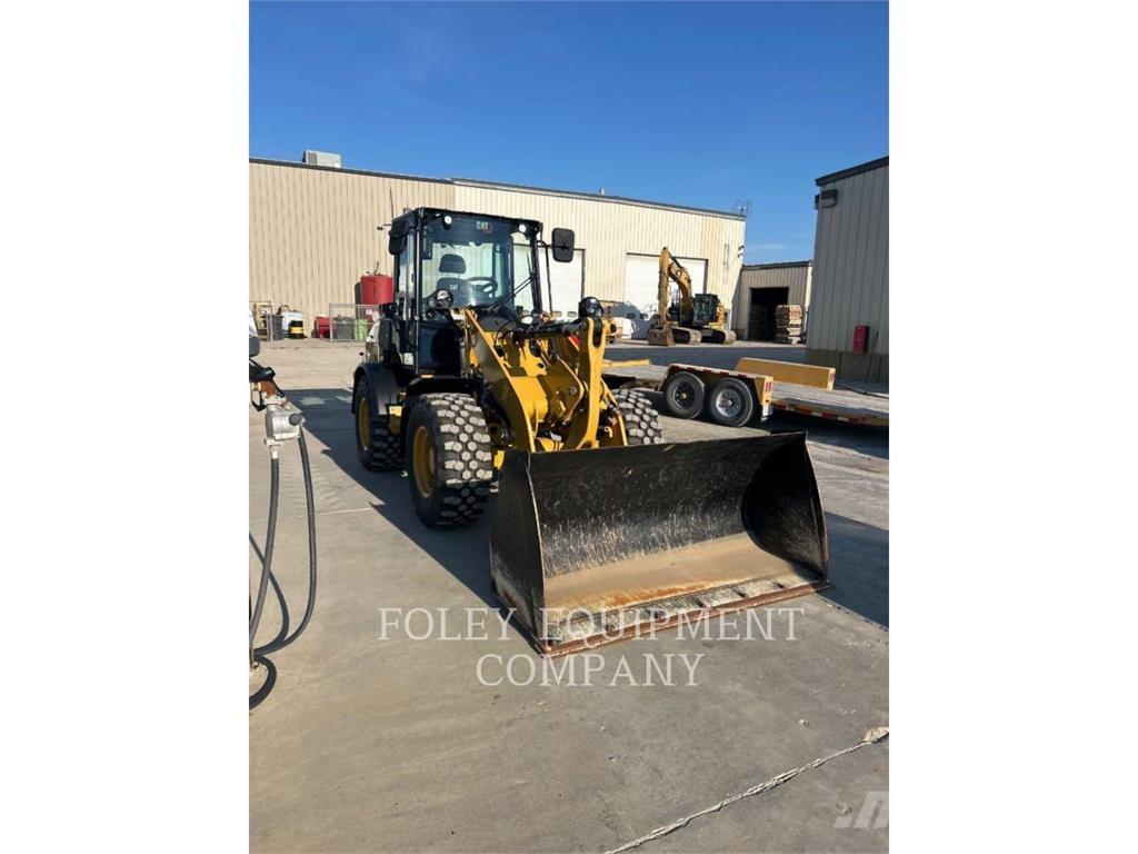 CAT 908-14 لوادر بعجل