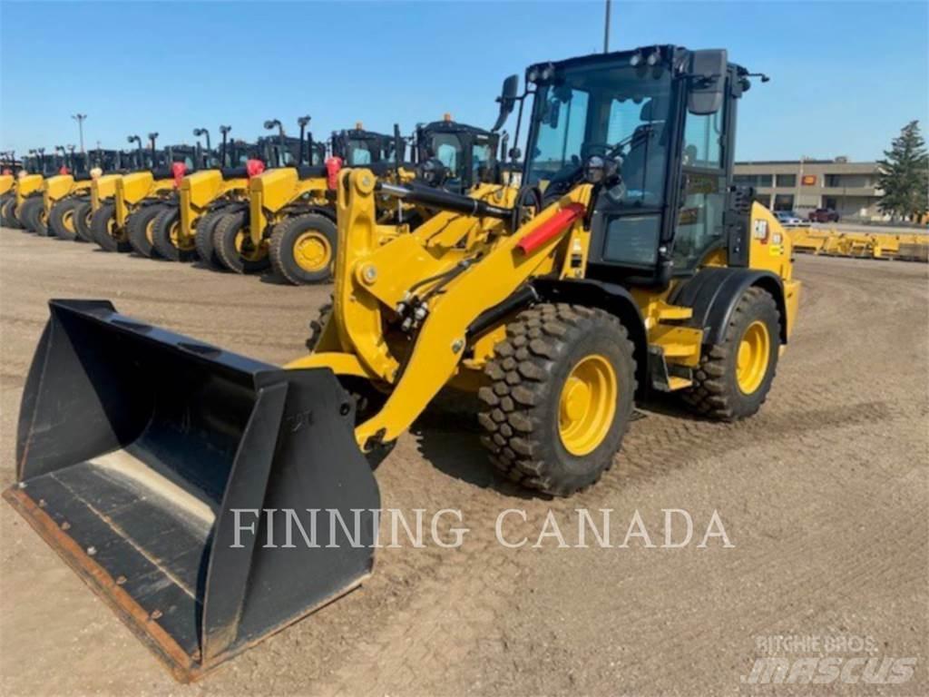 CAT 908-14 لوادر بعجل