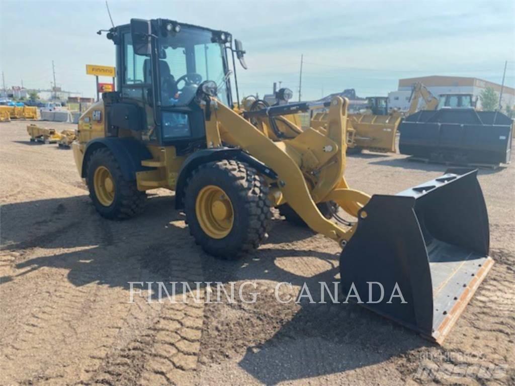 CAT 908-14 لوادر بعجل