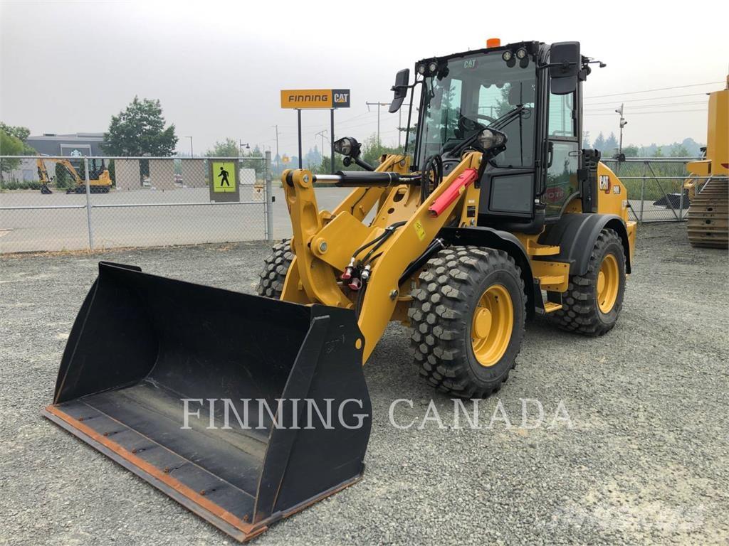 CAT 908-14 لوادر بعجل