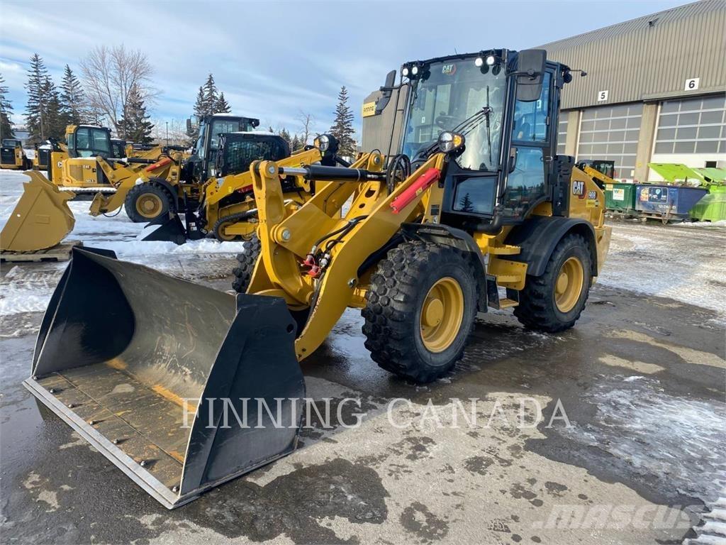 CAT 908-14 لوادر بعجل