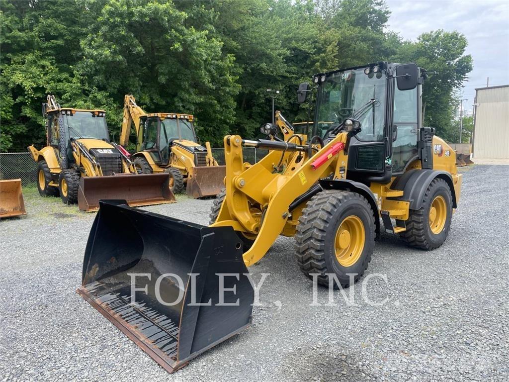 CAT 908-14 لوادر بعجل