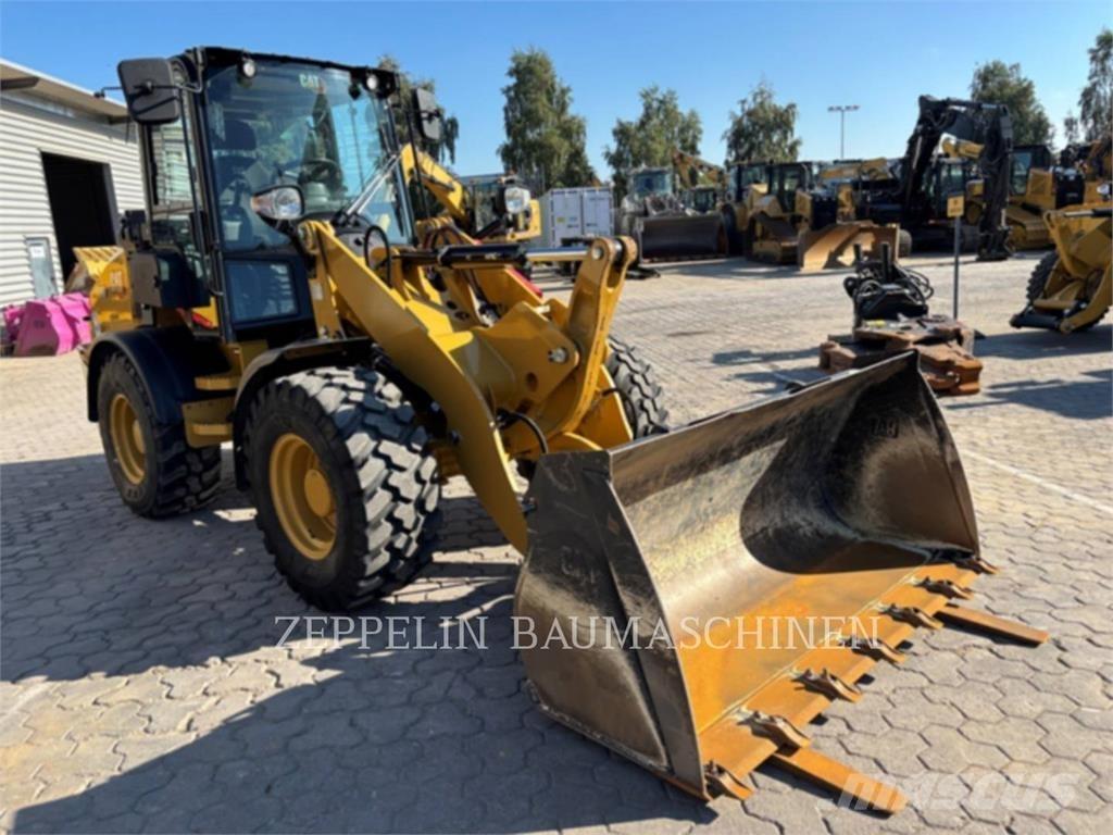 CAT 908-14 لوادر بعجل