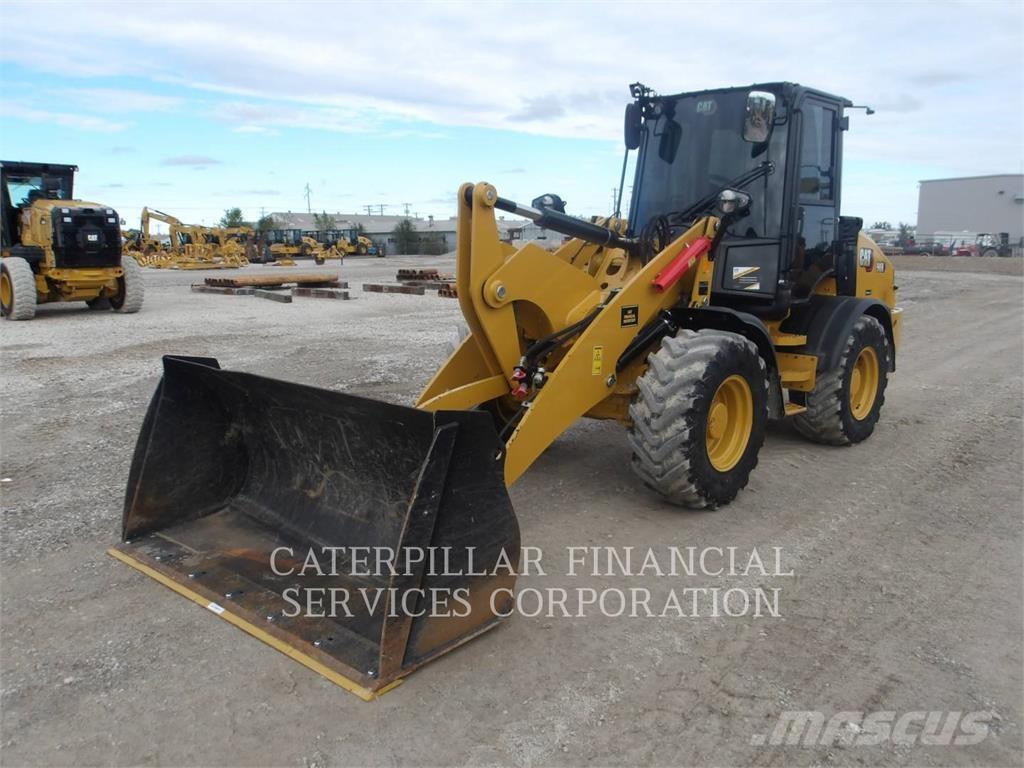 CAT 908-14 لوادر بعجل