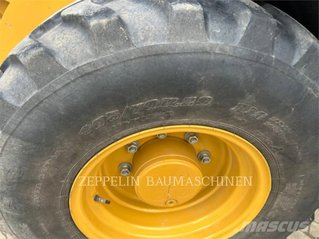 CAT 908-14 لوادر بعجل