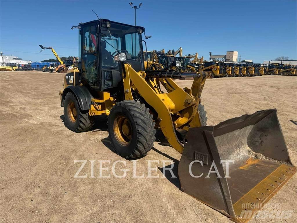 CAT 908H2 لوادر بعجل