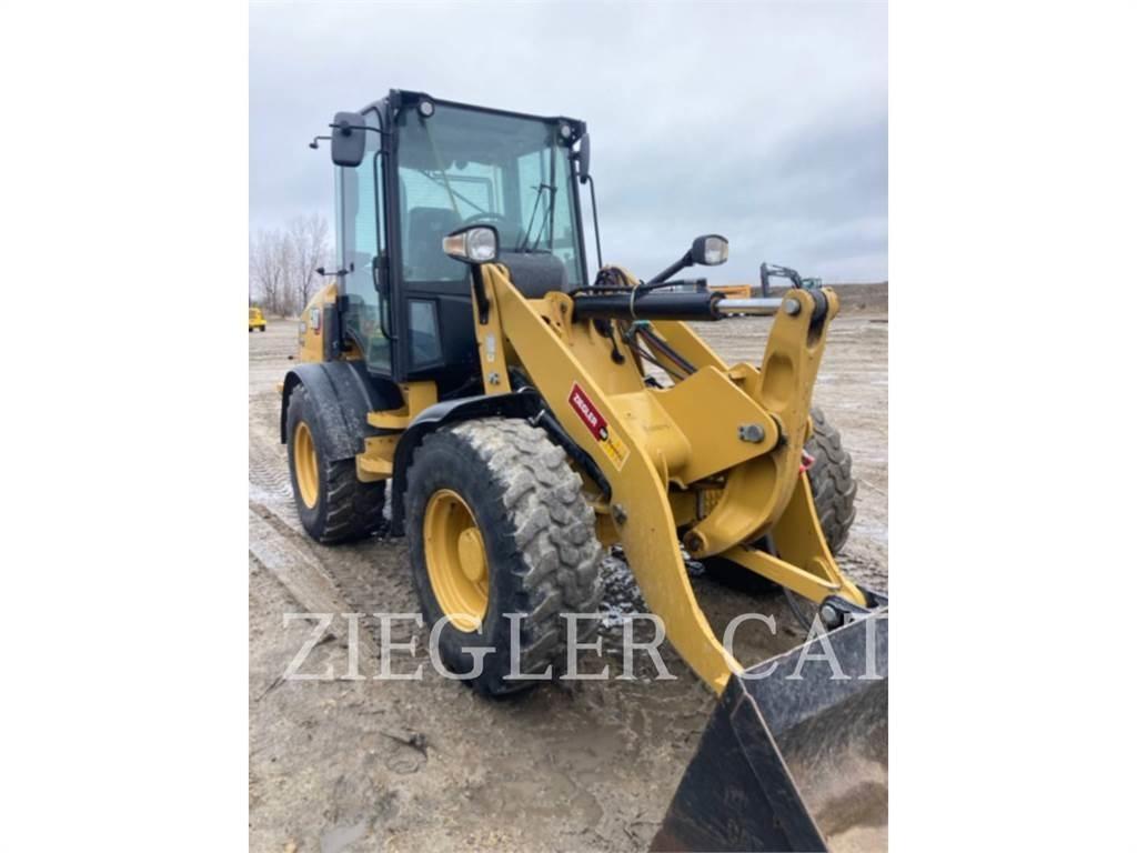 CAT 908M لوادر بعجل