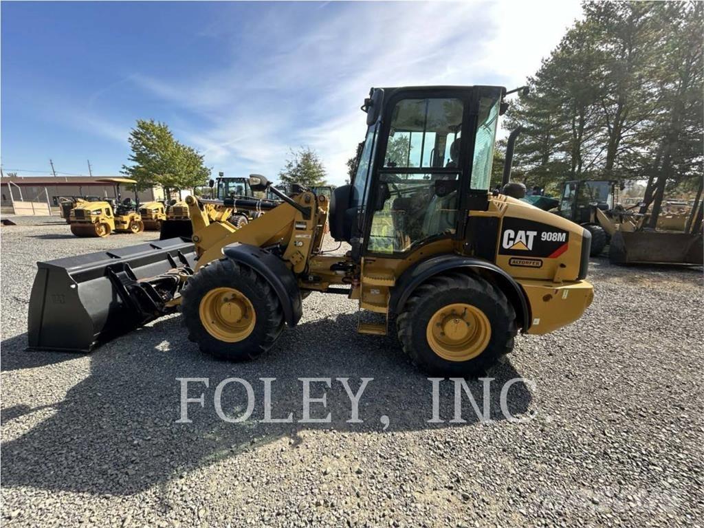 CAT 908M لوادر بعجل