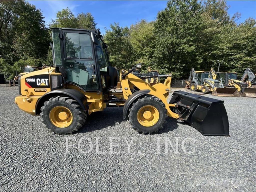 CAT 908M لوادر بعجل