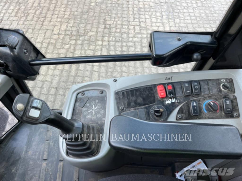 CAT 908M لوادر بعجل