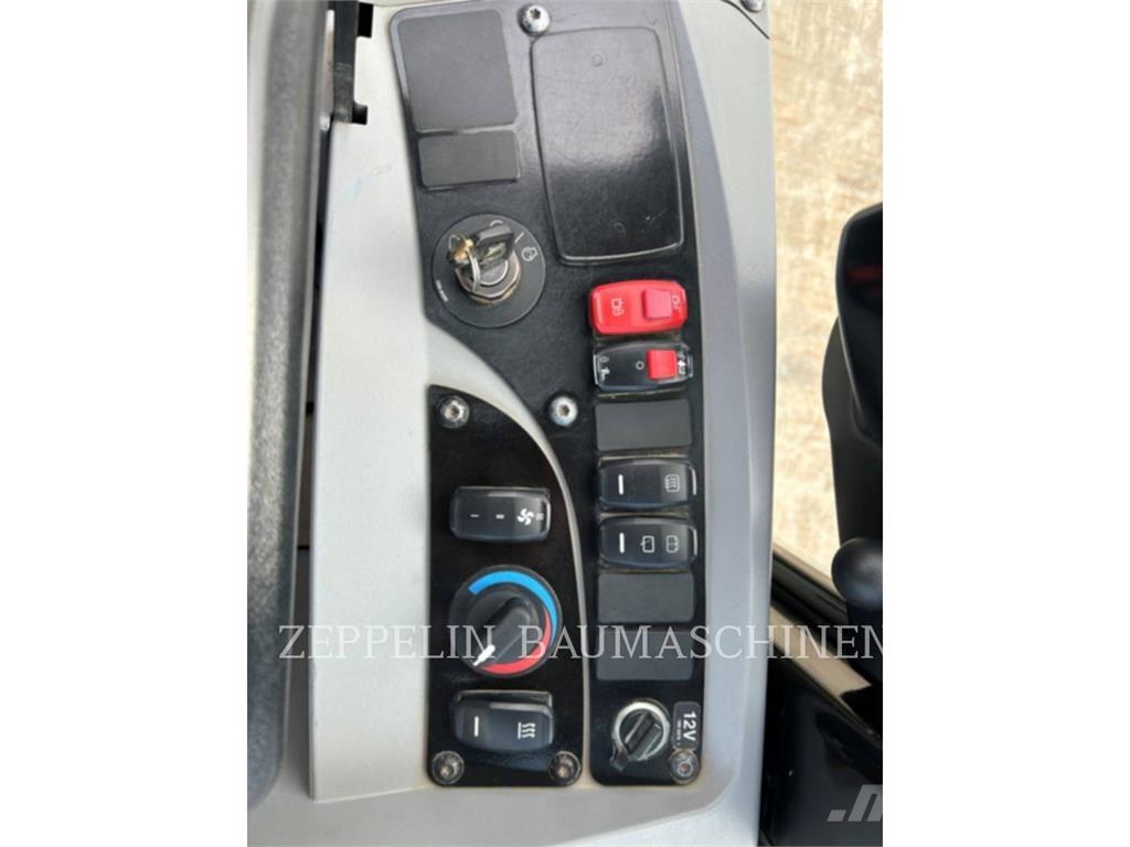 CAT 908M لوادر بعجل