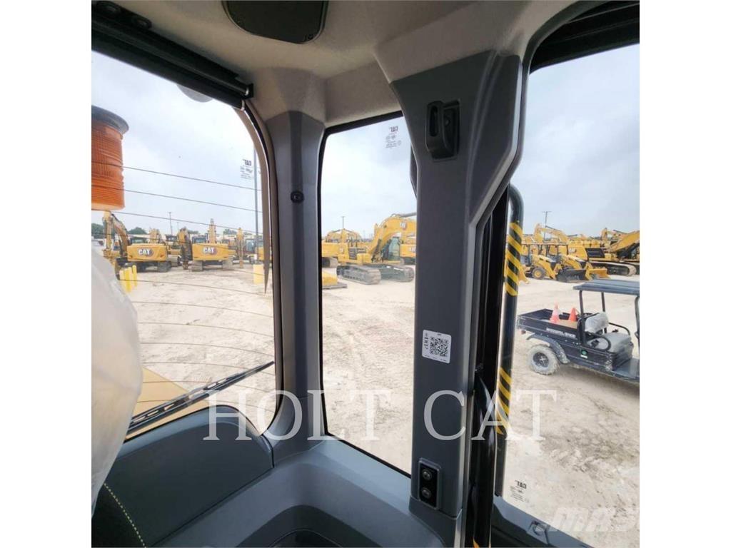 CAT 938 QC لوادر بعجل